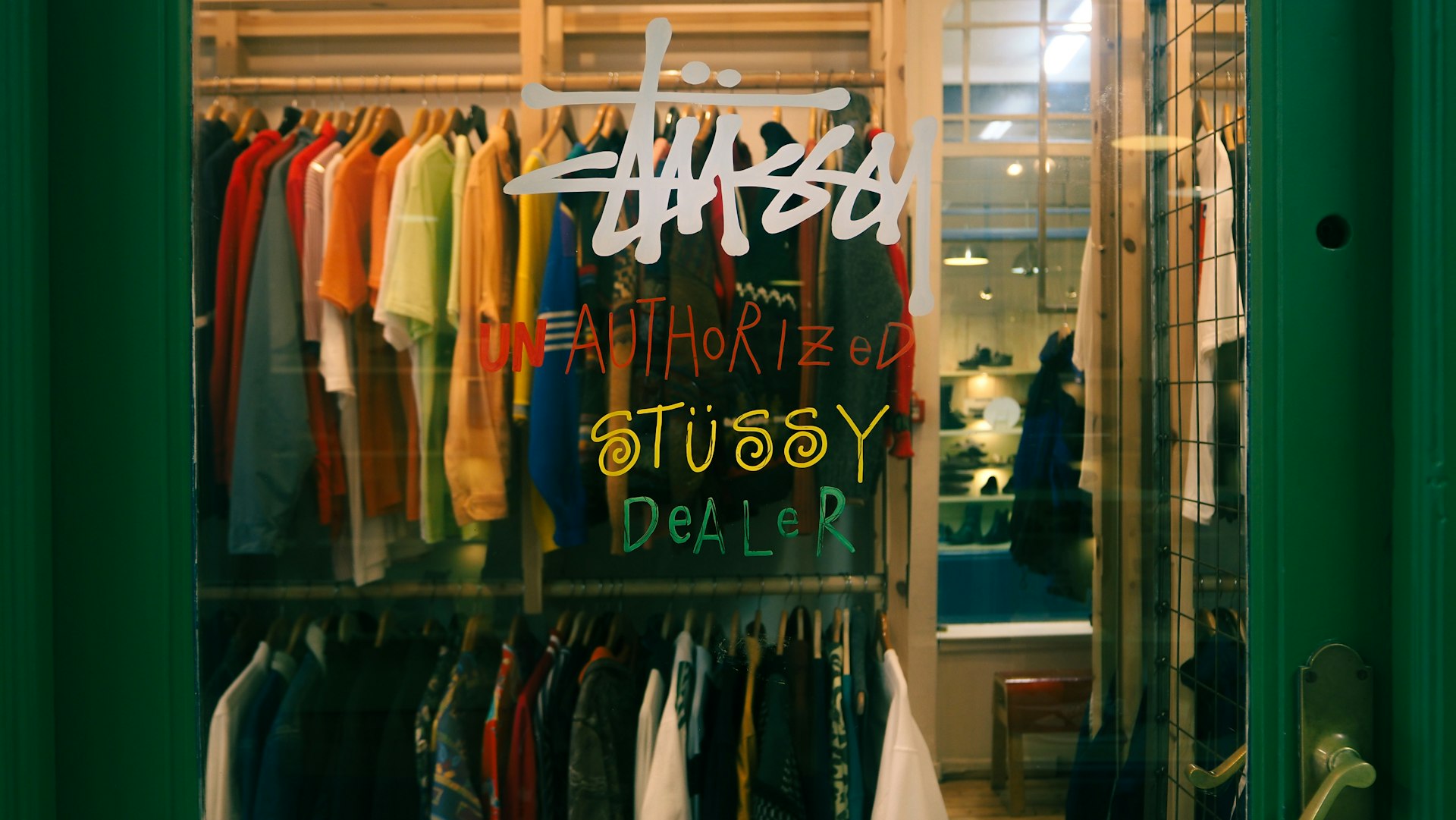 a store window with a sign that says shop